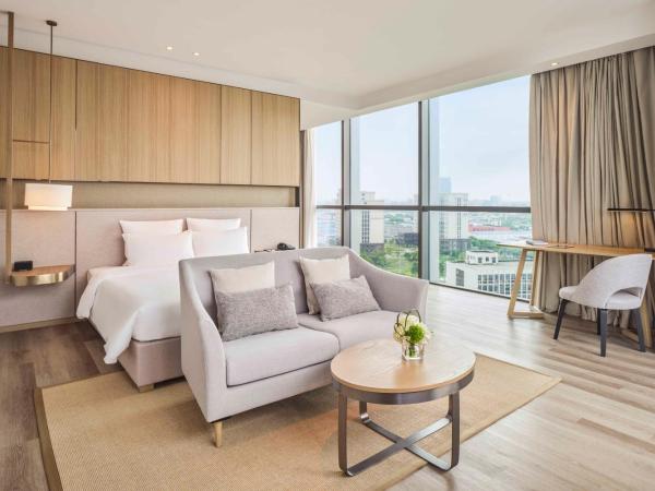 Novotel Shanghai Qingpu Excellence : photo 2 de la chambre chambre lit king-size deluxe