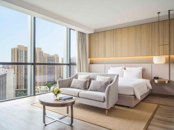 Novotel Shanghai Qingpu Excellence : photo 1 de la chambre chambre lit king-size supérieure