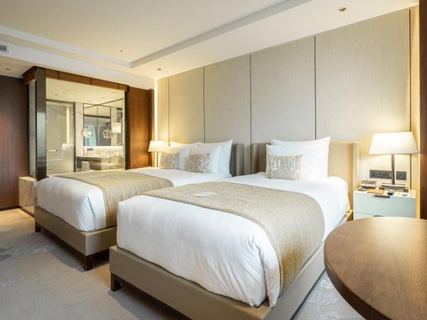 Lotte Hotel Seoul : photo 3 de la chambre grande chambre familiale lits jumeaux deluxe