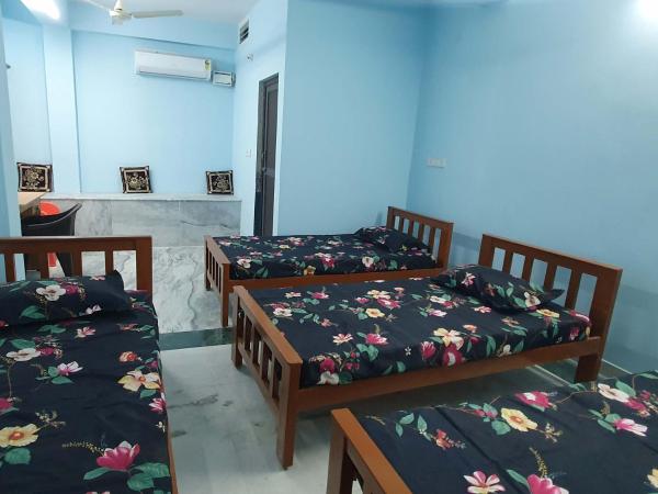 Sunshine Stay : photo 1 de la chambre chambre quadruple avec salle de bains