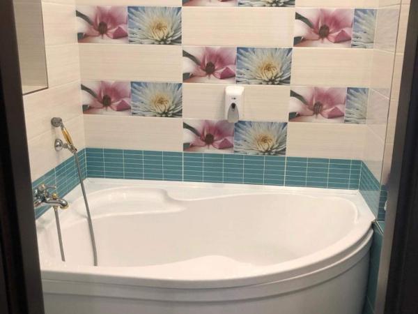 Mosoly Szallashely : photo 4 de la chambre chambre double deluxe avec baignoire