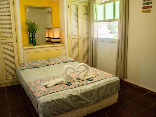 Solar Hostel Búzios : photo 2 de la chambre chambre familiale avec salle de bains