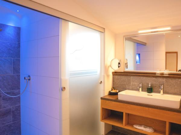 Garten - Hotel Sallerhof : photo 6 de la chambre deluxe triple-bedroom