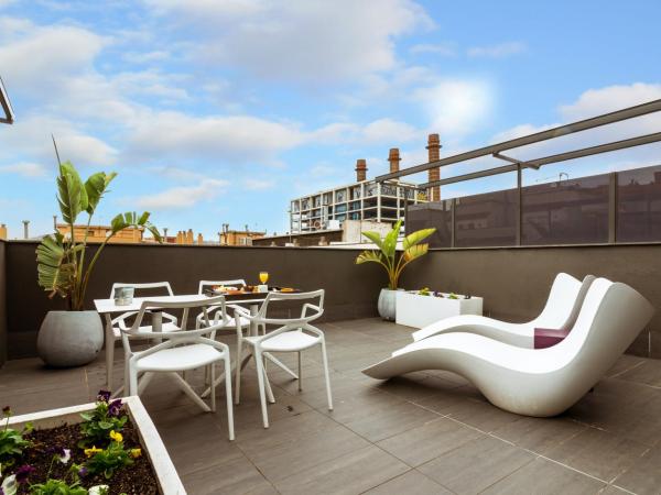 Grums Hotel & Spa : photo 5 de la chambre la chambre mansardée avec terrasse comprend un accès au spa par personne et par séjour