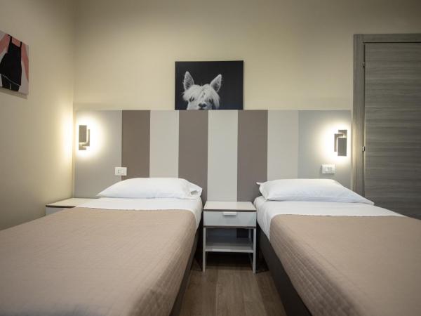 Le PALME : photo 3 de la chambre chambre lits jumeaux deluxe