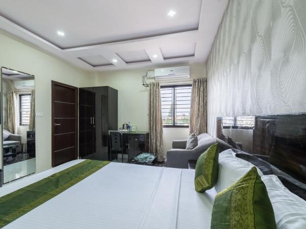 Treebo Greenwood Premier Suites, Old Airport Road : photo 2 de la chambre chambre double deluxe