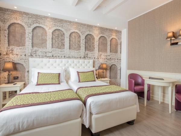 Hotel San Pietro : photo 3 de la chambre chambre lits jumeaux deluxe