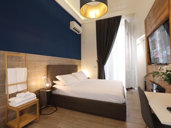 Comfort Zone Naples : photo 1 de la chambre chambre double de luxe avec baignoire spa 