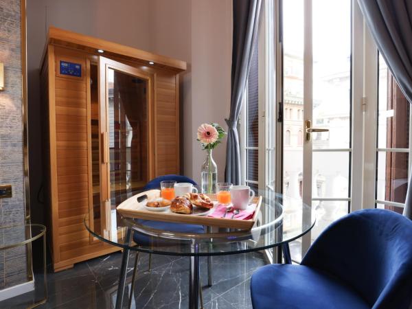 Comfort Zone Naples : photo 4 de la chambre suite lit queen-size avec baignoire spa