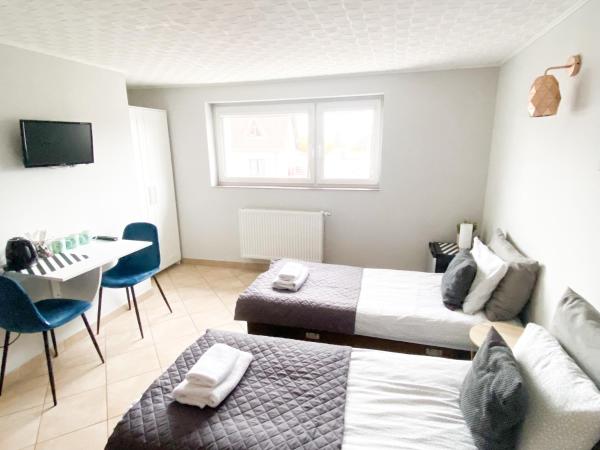 Pokoje Gościnne Przy Molo : photo 1 de la chambre chambre triple