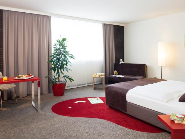Mercure Hotel Stuttgart Airport Messe : photo 2 de la chambre chambre lit king-size privilège avec canapé-lit