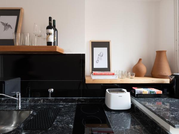 Stay Suites : photo 2 de la chambre chambre deluxe double ou lits jumeaux