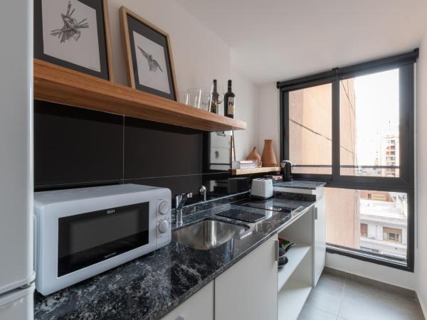 Stay Suites : photo 1 de la chambre chambre deluxe double ou lits jumeaux