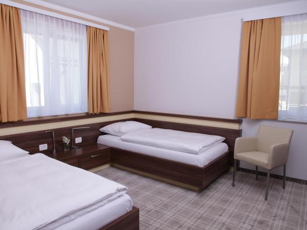 Primus Hotel & Apartments : photo 1 de la chambre appartement familial