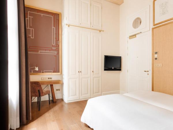 DO Plaa Reial powered by Sonder : photo 3 de la chambre chambre lits jumeaux avec balcon