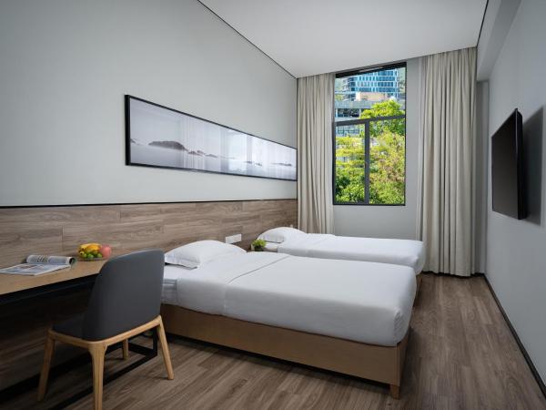 Unijoy Cityinn OCT Loft Shenzhen有集城市客栈创意园店 : photo 3 de la chambre chambre lits jumeaux supérieure