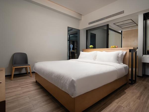 Unijoy Cityinn OCT Loft Shenzhen有集城市客栈创意园店 : photo 1 de la chambre chambre lit queen-size deluxe