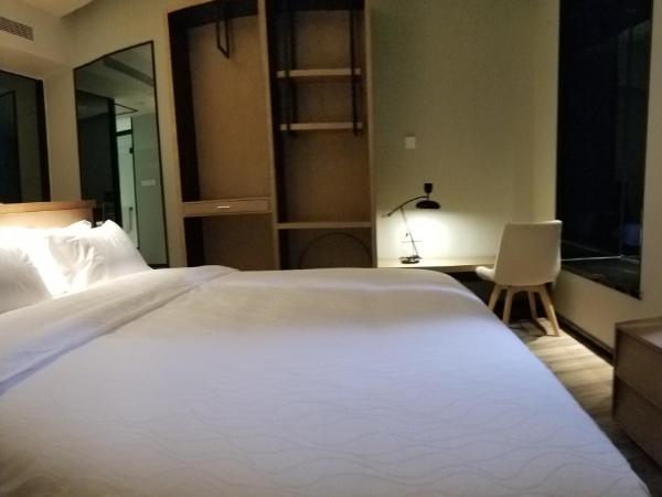 Unijoy Cityinn OCT Loft Shenzhen有集城市客栈创意园店 : photo 2 de la chambre chambre lit queen-size deluxe