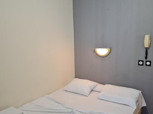 Hôtel Le Milan : photo 1 de la chambre chambre simple