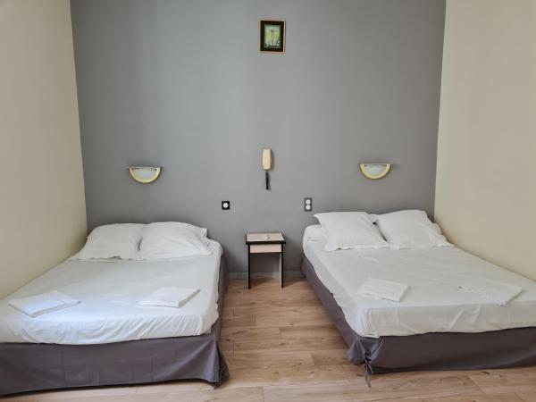 Hôtel Le Milan : photo 1 de la chambre chambre quadruple