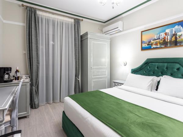 Pandrosos Divine Suites : photo 3 de la chambre suite pandrosos - vue partielle sur acropole avec terrasse