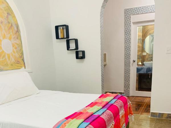 The Quetzal : photo 3 de la chambre suite - vue sur jardin