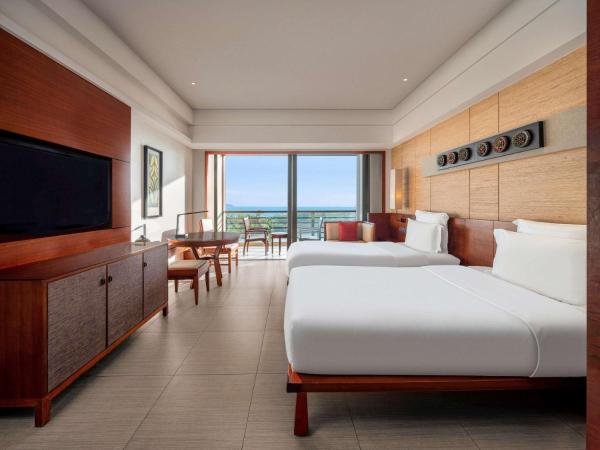 Pullman Oceanview Sanya Bay Resort & Spa : photo 1 de la chambre grand hébergement lits jumeaux - vue sur océan