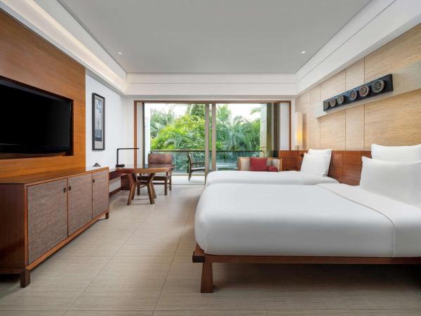 Pullman Oceanview Sanya Bay Resort & Spa : photo 1 de la chambre chambre supérieure avec lit king-size - vue sur jardin