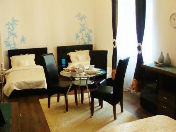 Sleep Well : photo 5 de la chambre chambre triple avec salle de bains commune