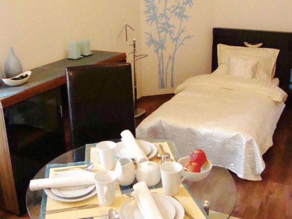 Sleep Well : photo 6 de la chambre chambre triple avec salle de bains commune