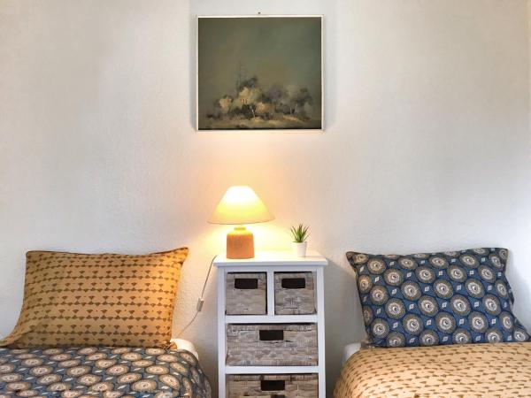 Lindo Lugar - just a 7 minute walk from the airport : photo 2 de la chambre chambre lits jumeaux Économique