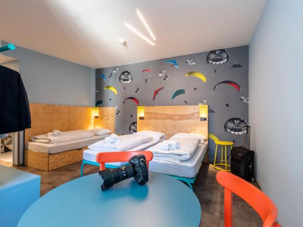 MEININGER Hotel Innsbruck Zentrum : photo 5 de la chambre chambre triple