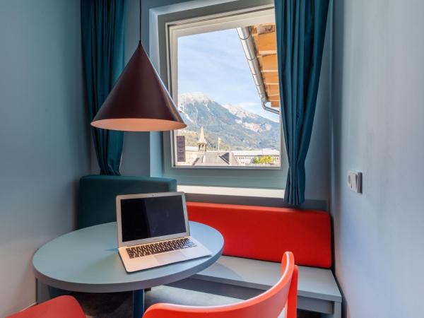 MEININGER Hotel Innsbruck Zentrum : photo 4 de la chambre chambre lits jumeaux