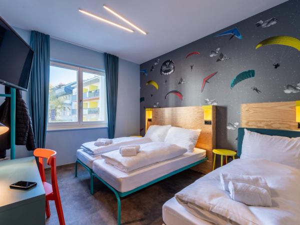 MEININGER Hotel Innsbruck Zentrum : photo 2 de la chambre chambre triple