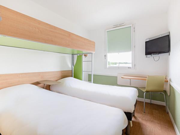ibis budget Carcassonne Aéroport - A61 : photo 4 de la chambre chambre triple