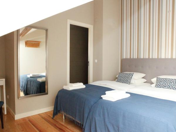 Flores Guest House : photo 3 de la chambre grande chambre double ou lits jumeaux