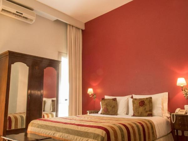 Magnolia Hotel Boutique : photo 1 de la chambre chambre double standard