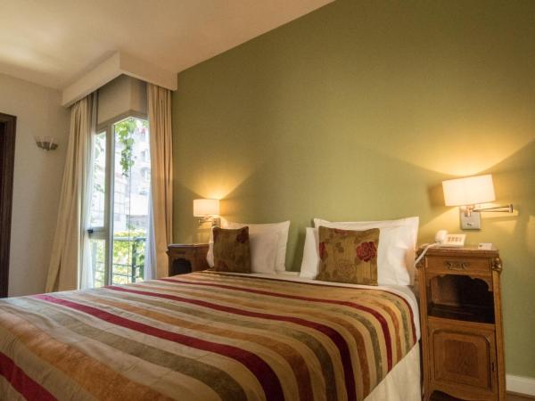 Magnolia Hotel Boutique : photo 4 de la chambre chambre double ou lits jumeaux supérieure