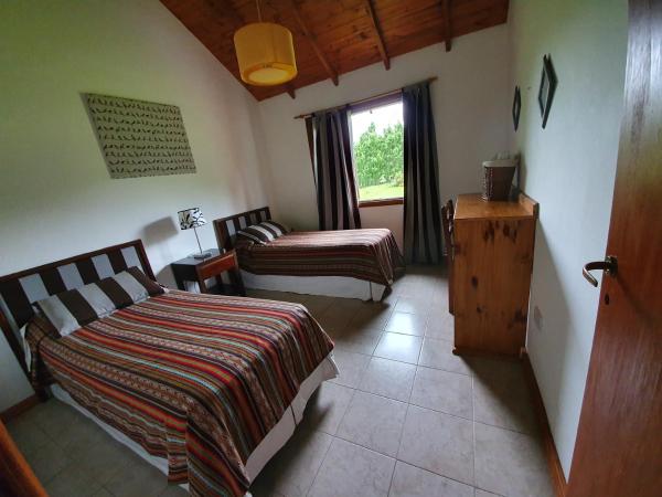 Cabañas Normana Inn : photo 8 de la chambre bungalow - vue sur jardin