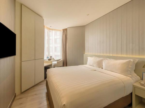 Ashley Wahid Hasyim Jakarta : photo 1 de la chambre chambre supérieure lit queen-size