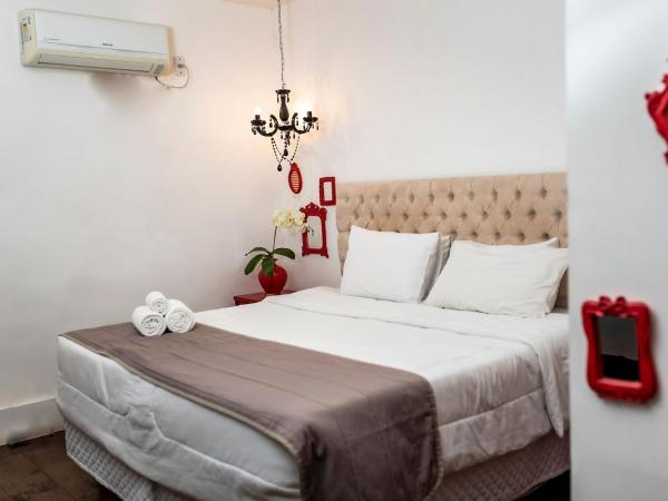 Pousada Guanabara Garden : photo 3 de la chambre chambre triple