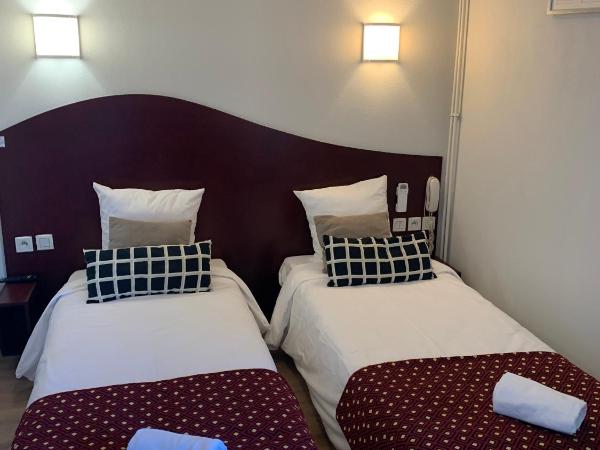 Hotel les Commercants : photo 3 de la chambre chambre lits jumeaux