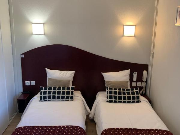 Hotel les Commercants : photo 9 de la chambre chambre lits jumeaux