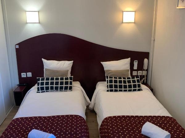 Hotel les Commercants : photo 6 de la chambre chambre lits jumeaux