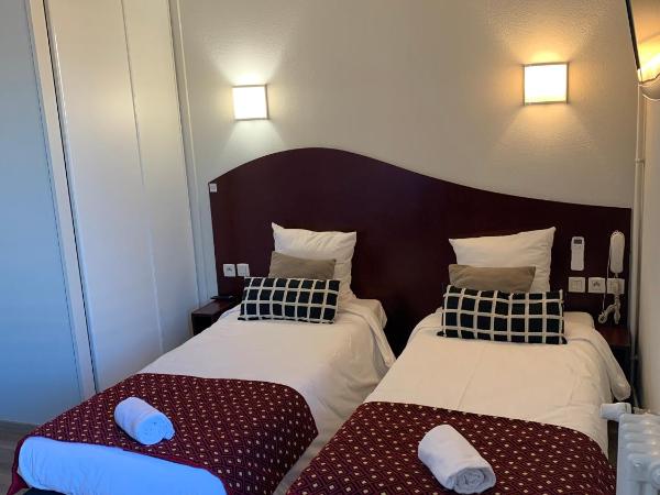Hotel les Commercants : photo 5 de la chambre chambre lits jumeaux