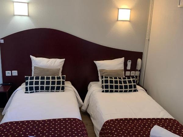 Hotel les Commercants : photo 8 de la chambre chambre lits jumeaux