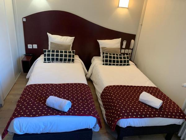 Hotel les Commercants : photo 4 de la chambre chambre lits jumeaux