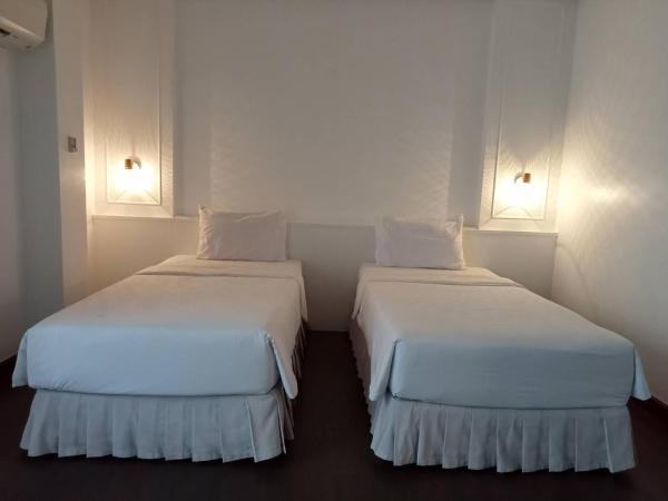 BaanBusarin Hotel : photo 4 de la chambre chambre double ou lits jumeaux avec balcon