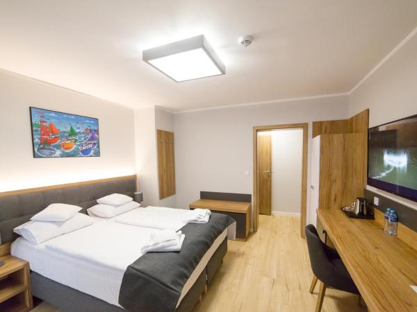 Villa Aura : photo 1 de la chambre chambre triple