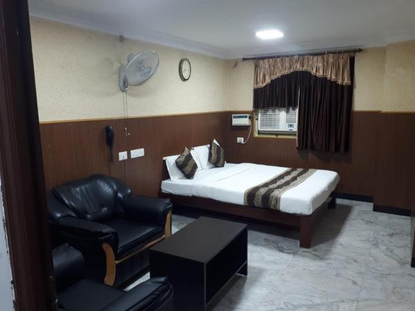 Rmc travellers inn : photo 1 de la chambre chambre double deluxe